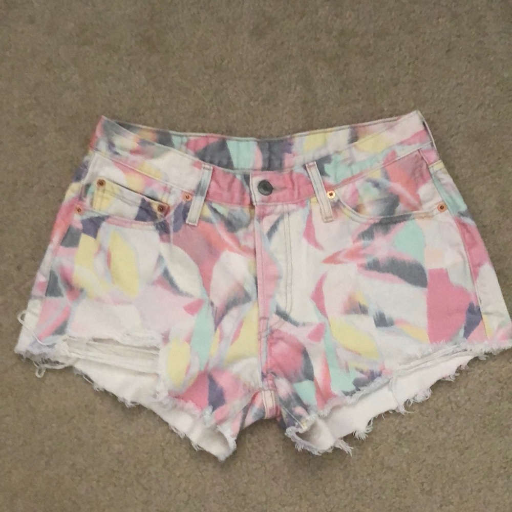 Levi’s 501 distressed pastel tie dye jeans shorts.